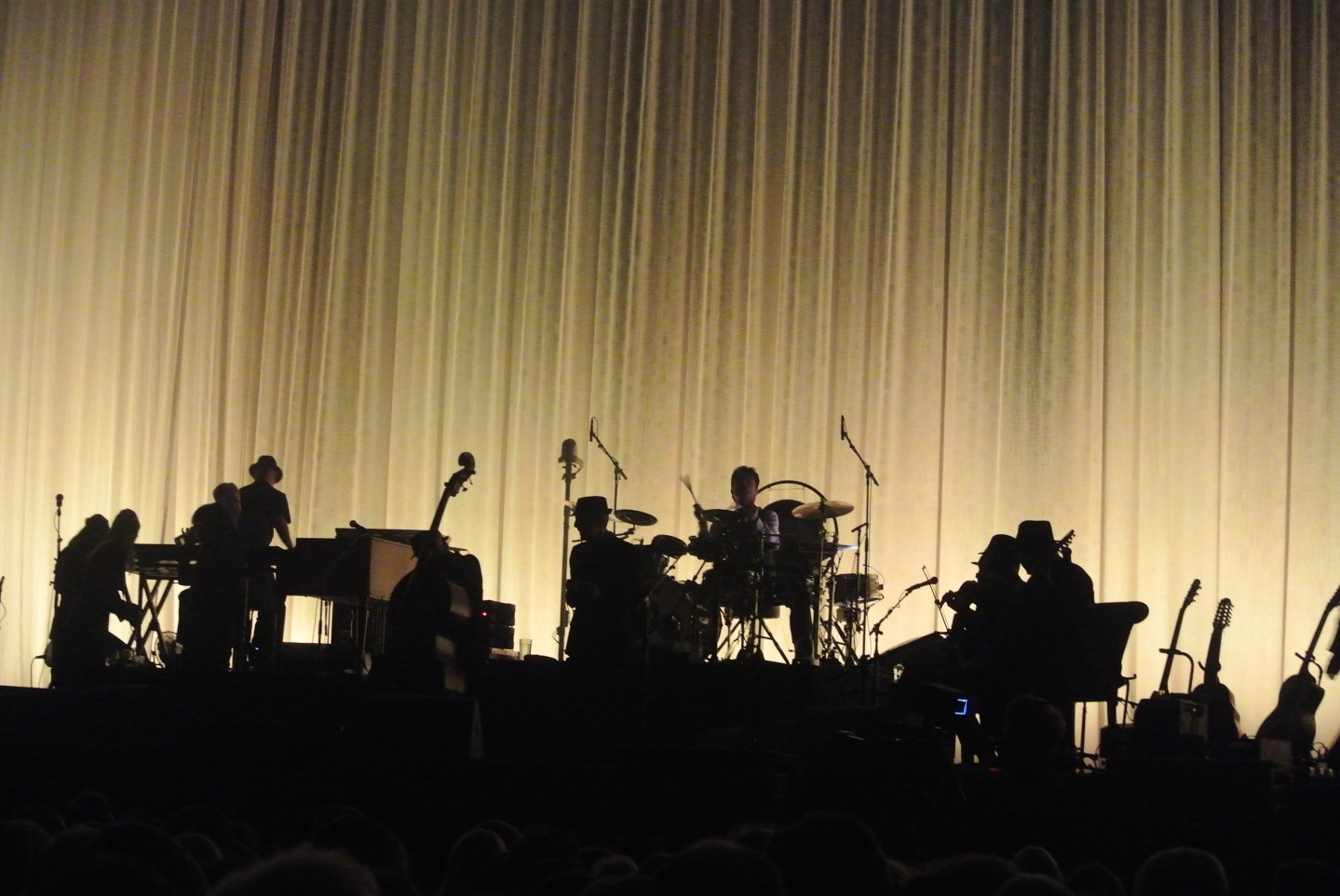 Leonard Cohen and his band - silhouette